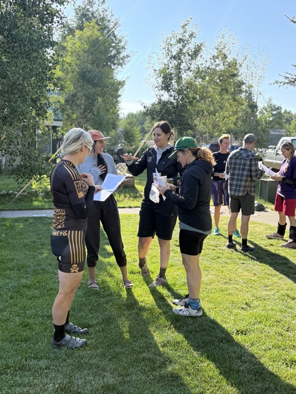 Clinicians working through a wilderness medicine scenario outdoors